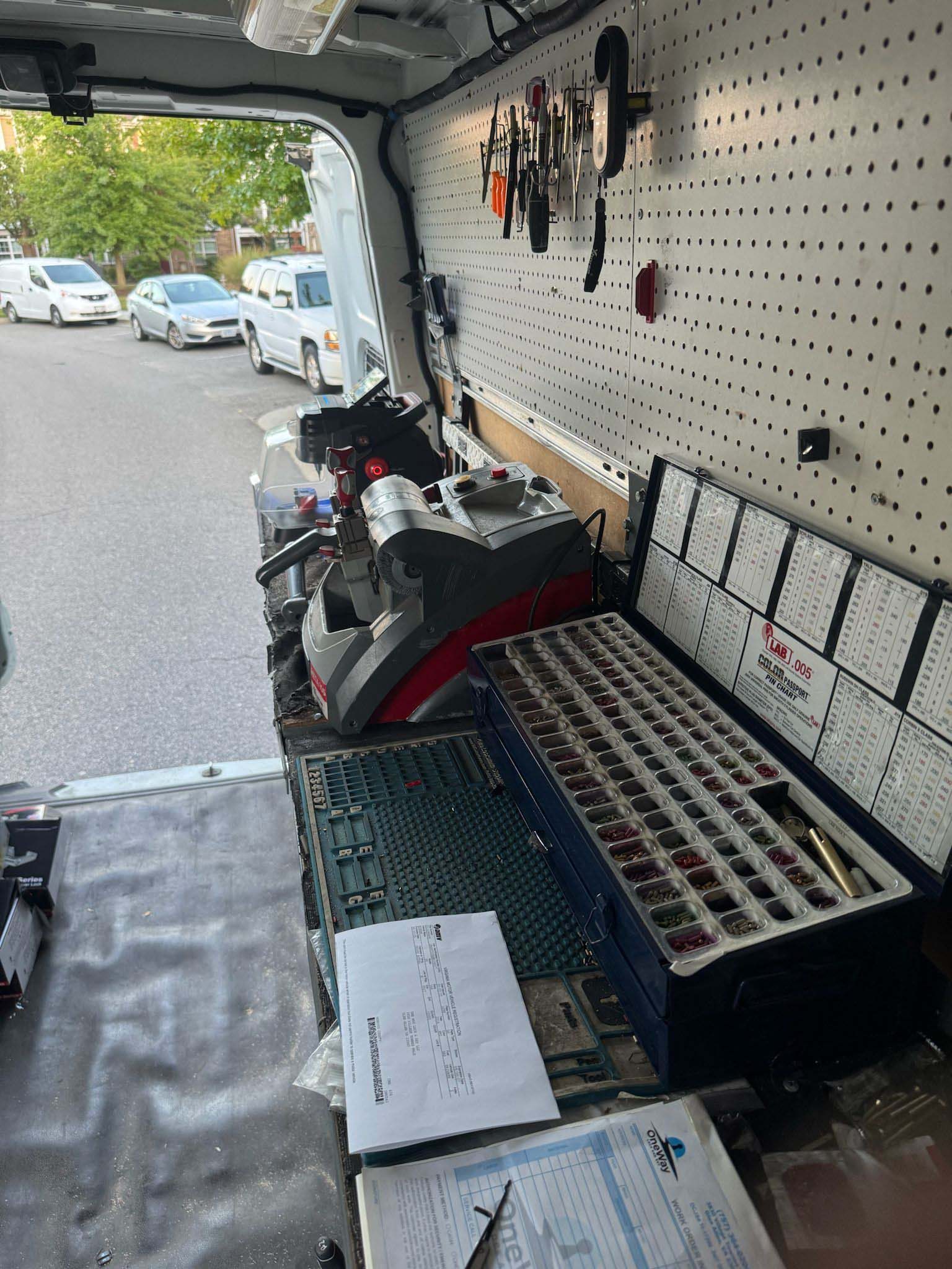 Inside the One Way Lock and Key mobile workshop — key-cutting and pinning equipment